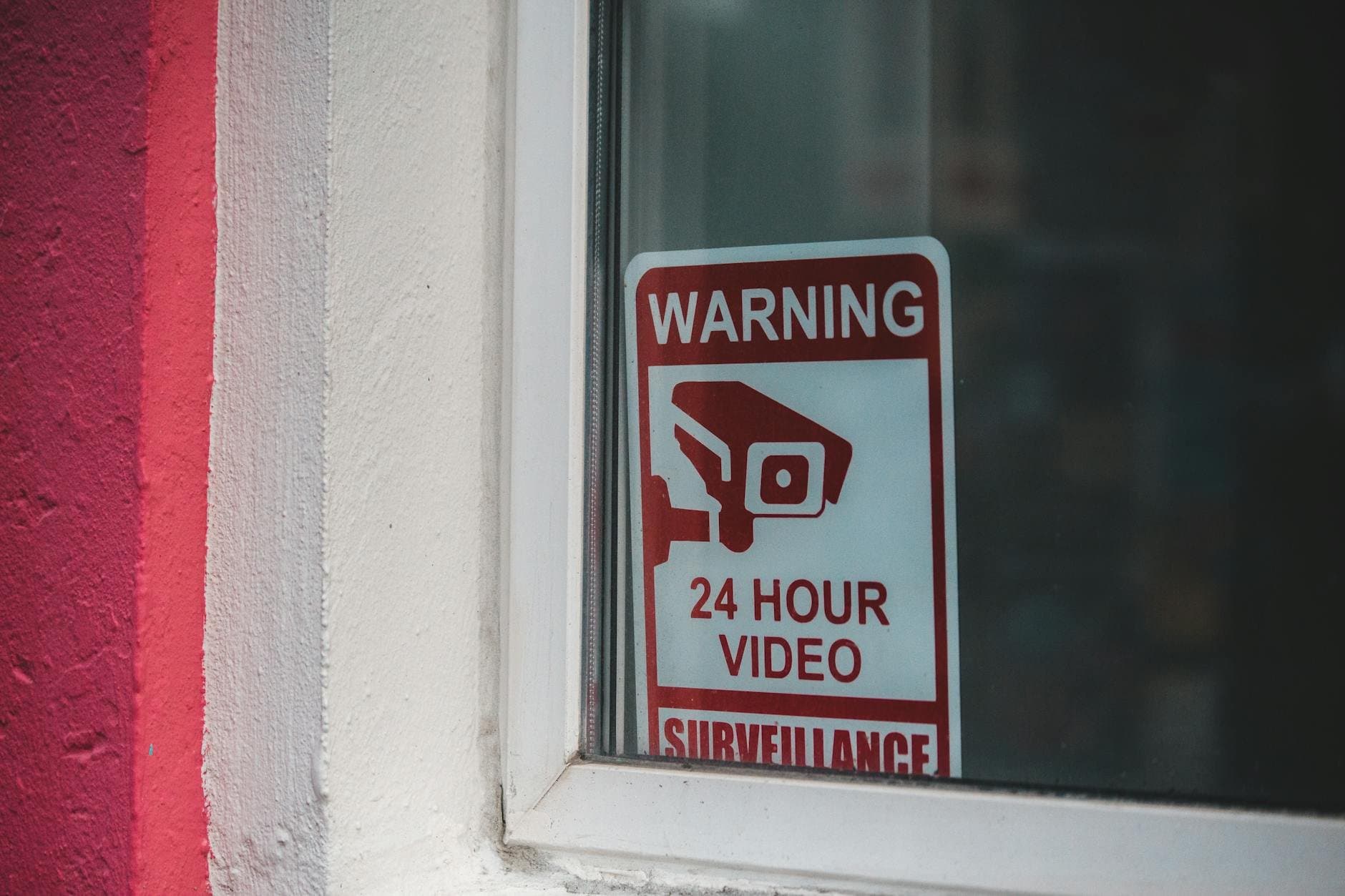 close up of a warning sign or security icon on a screen (Pexels)